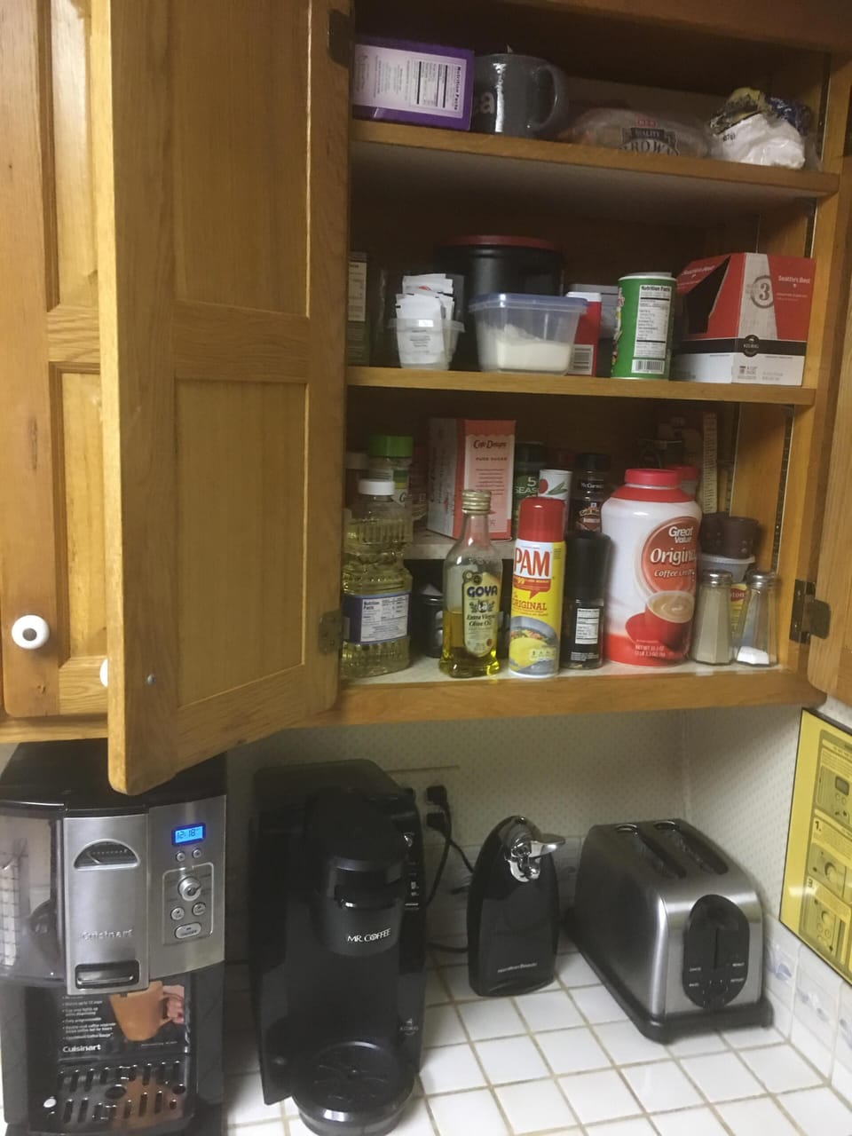 12 cup coffee maker and Mr. Coffee single pod.  Pantry w/coffee, spices, etc