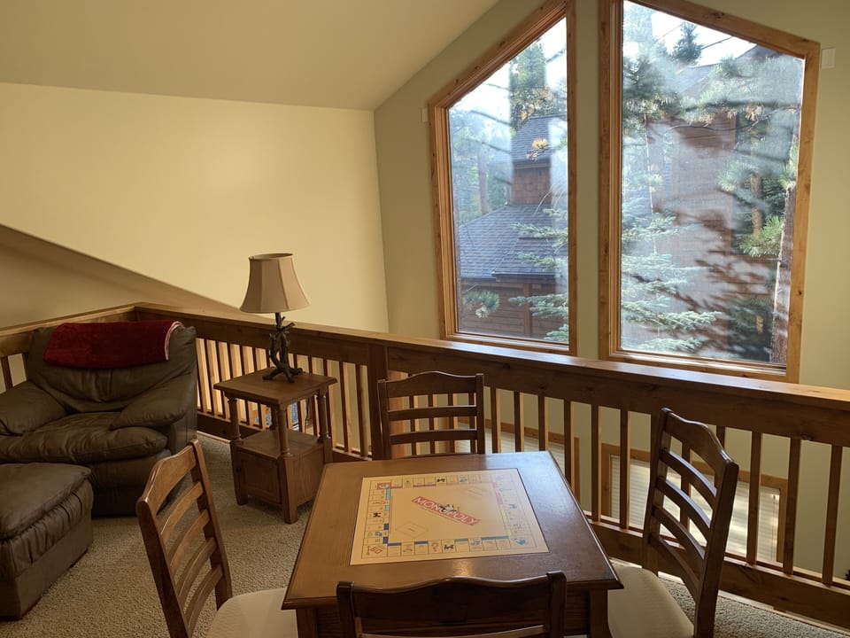 Voft with a game table and mountain views. 