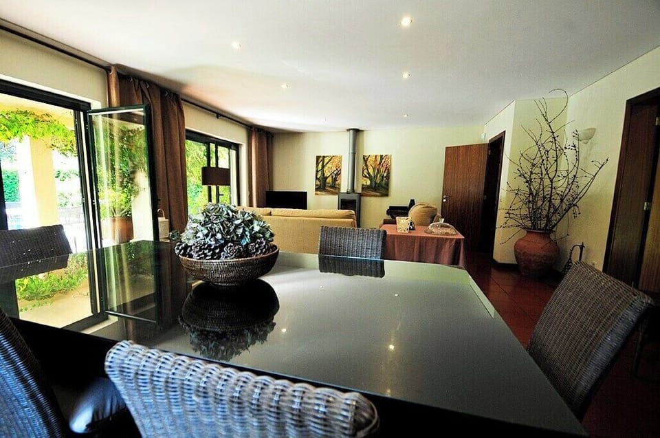 Dining room with patio doors to the swimming pool