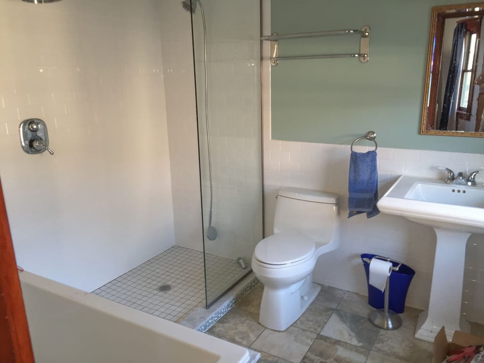 Master bath... shower and deep tub. Private, off bedroom.