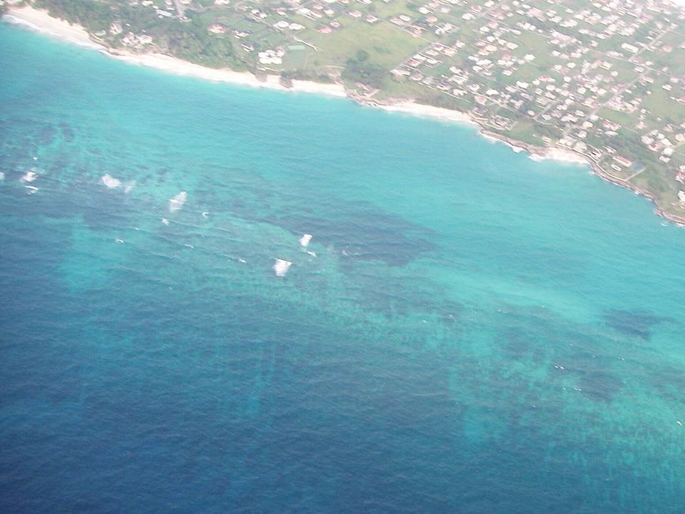 Aerial view of beaches surrounding villa (lower right beach below villa)