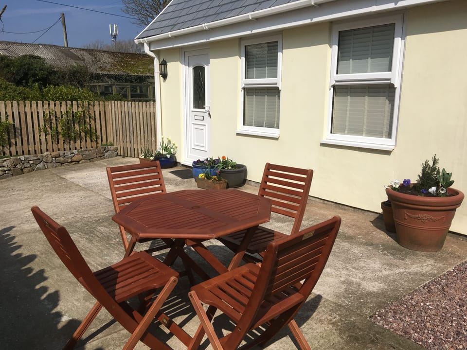 The front garden has a large patio and catches the sun all day.