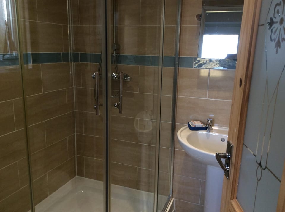 Separate downstairs cloakroom and shower room. 