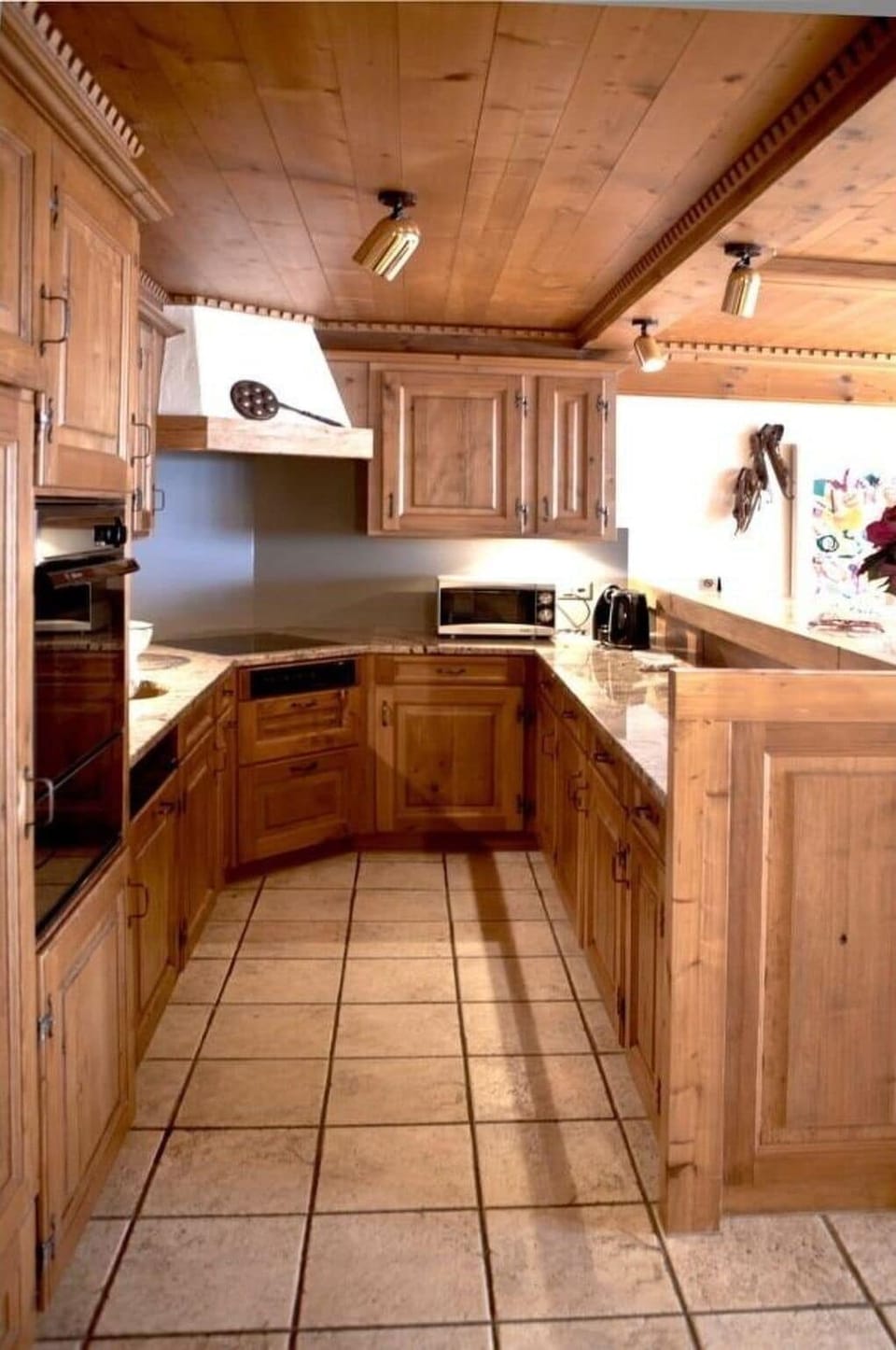 Brown, Cabinetry, Property, Countertop, Wood, Interior Design, Tap, Kitchen Appliance, Kitchen, Wood Stain