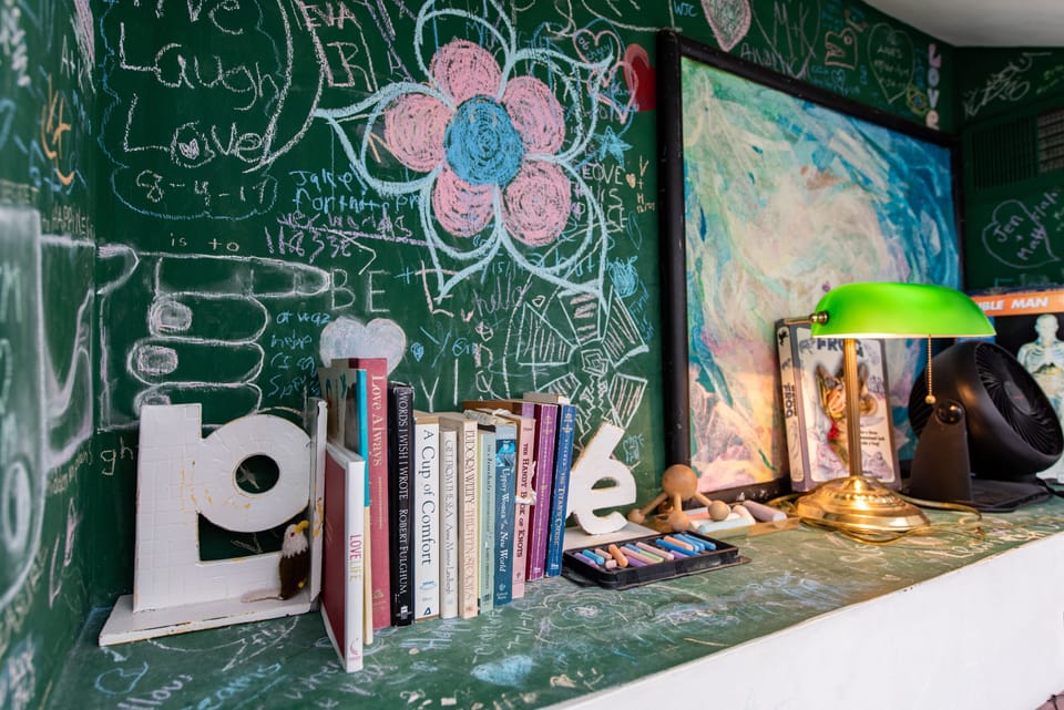 Chalkboard wall in loft inset. 