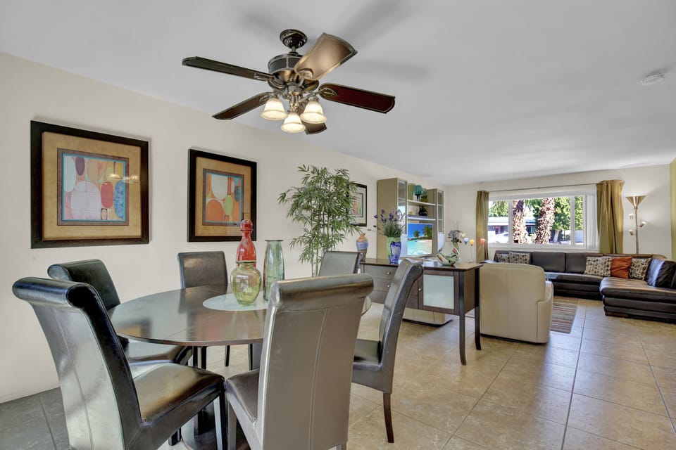 Dining room with living room in background