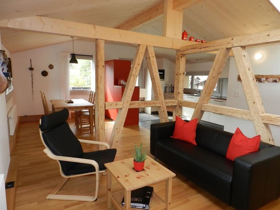 Furniture, Property, Couch, Wood, Interior Design, Comfort, Building, Floor, Living Room, Flooring