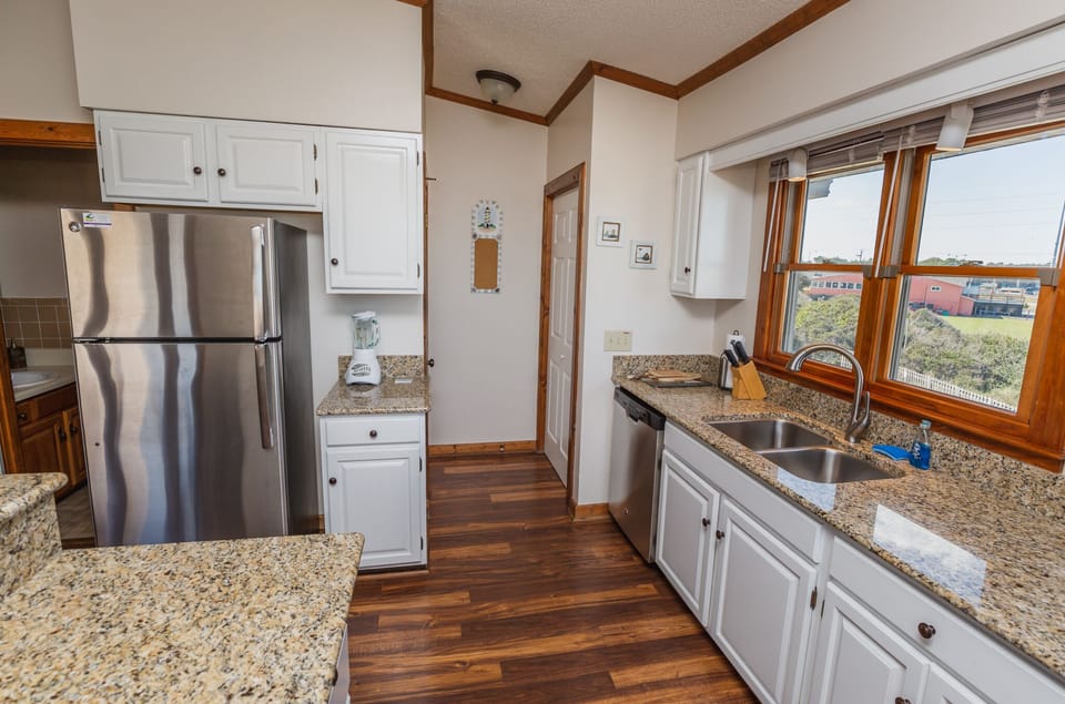 Spacious upgraded kitchen to entertain, prepare a meal, or enjoy a sunset.