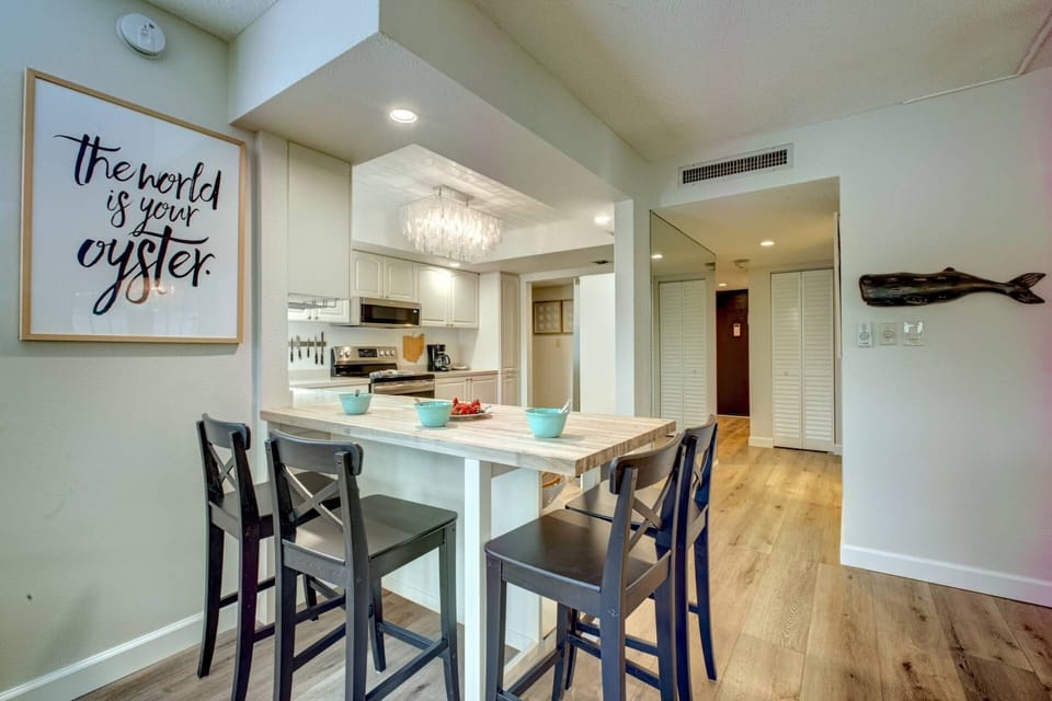 View from the living room into the kitchen.  The kids can eat separately from the adults.