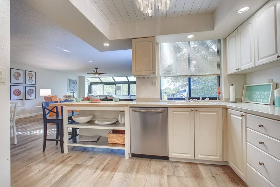 Stainless kitchen with white custom cabinets.  Everything you need for your chef to whip up family meals.