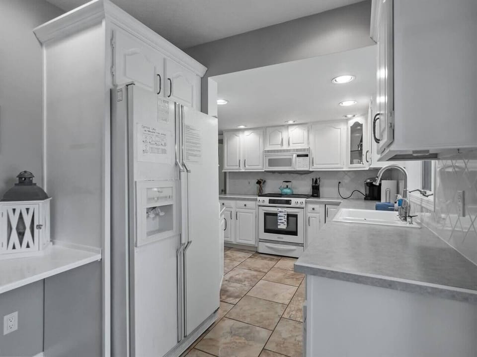 Third view of fully stocked kitchen
