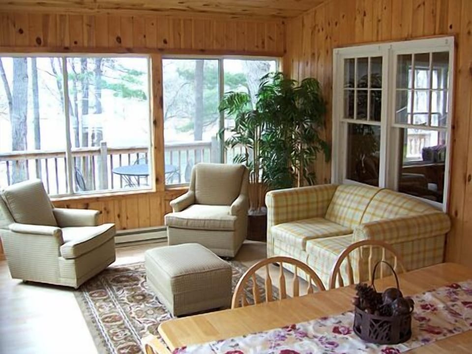 Light, breezy porch is perfect for afternoon naps and evening socials.