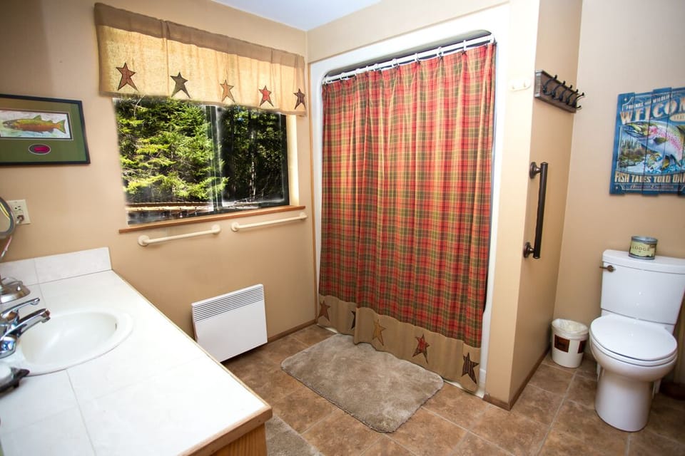 large bathroom with laundry