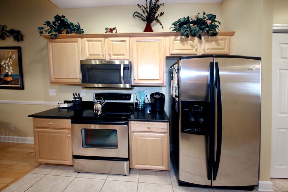 Fully stocked kitchen with your choice of a regular Cuisinart coffee pot  Keurig