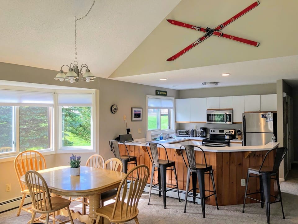 The open concept featuring the dining area and kitchen area.