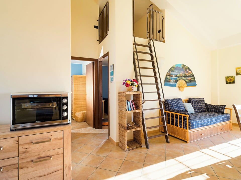 Villa Acquerello is all on the ground floor. The ladder you see on the pictures is purely decorative. It leads to a mezzanine that is closed.