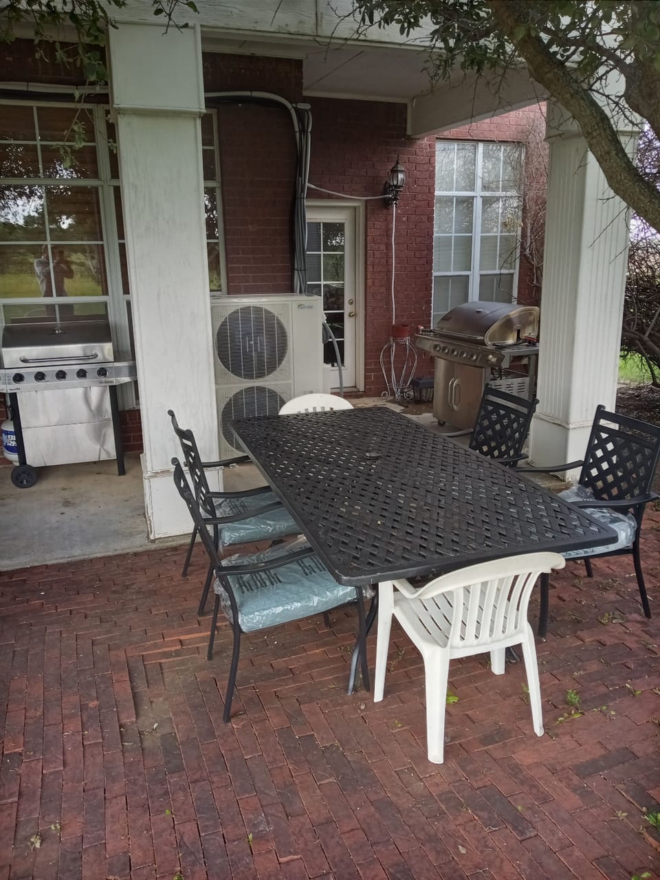 We have two gas grills & one wood burning grill & several outdoor tables 