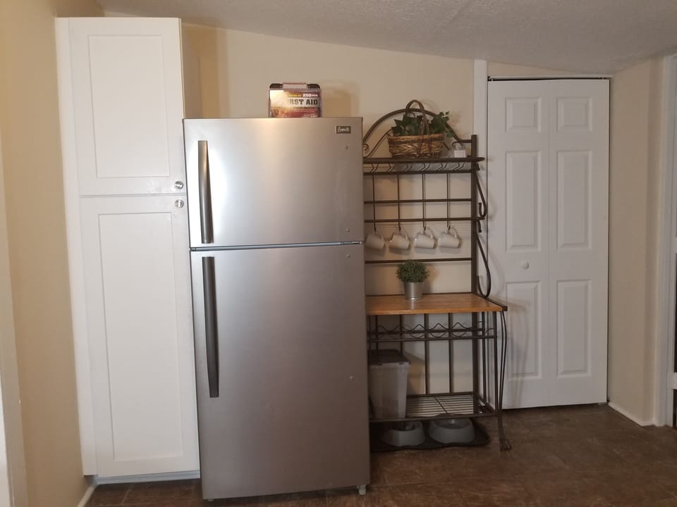 Pantry stores dishes, glassware etc.