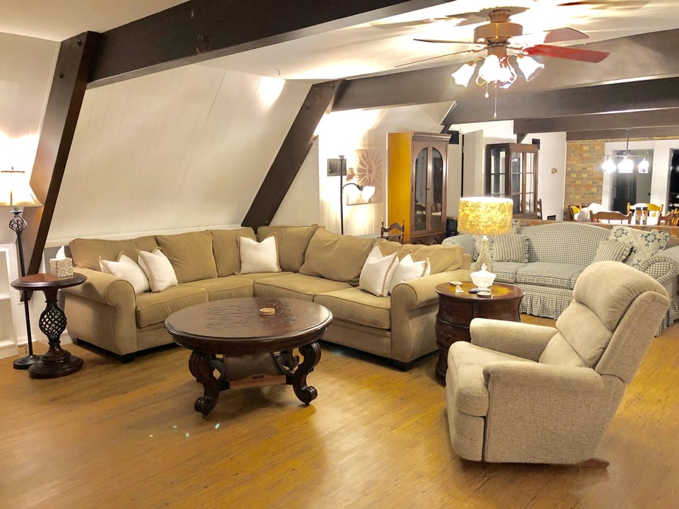 Entry loving space with 52” flat screen Smart TV