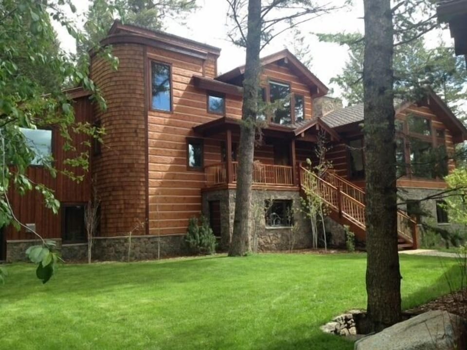 Exterior of house and large lawn area