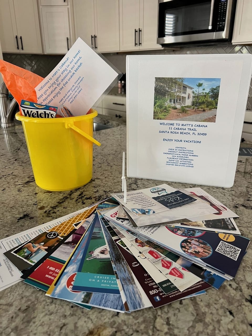 A packet of placards w/ fun things to do, &  a binder w/ dining recommendations 