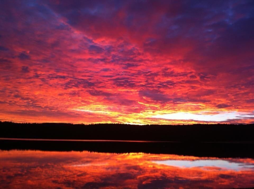An unbelievable sunrise on Moose Pond taken from Pencil Point
