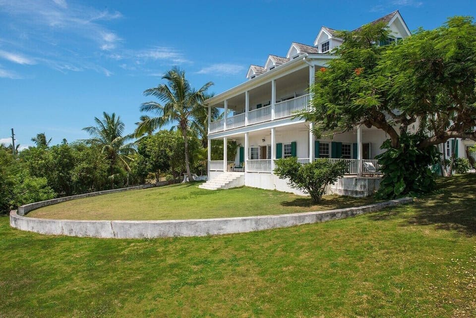 Wrap around verandas with harbor views overlooking the large lawns.