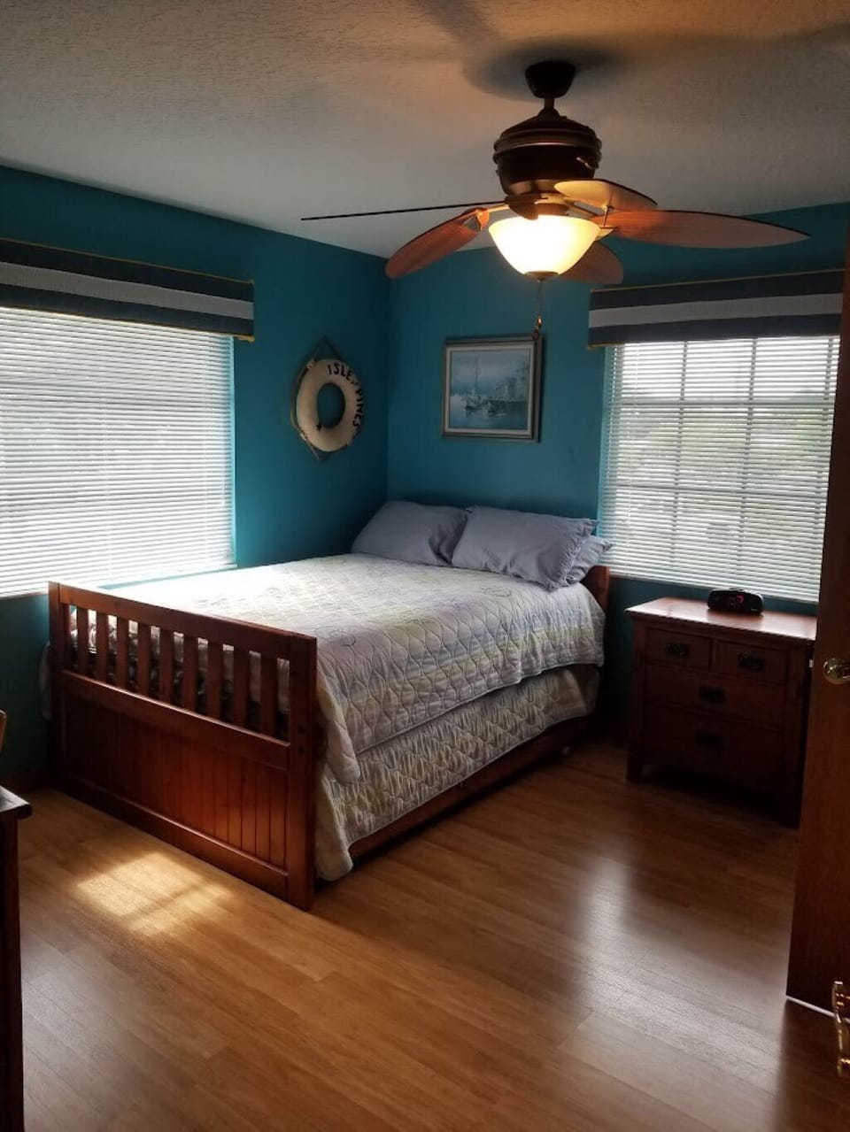 Blue bedroom second floor 2 full size beds 1 pulls out from under bed 