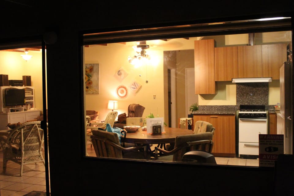Peeking in from the patio at night