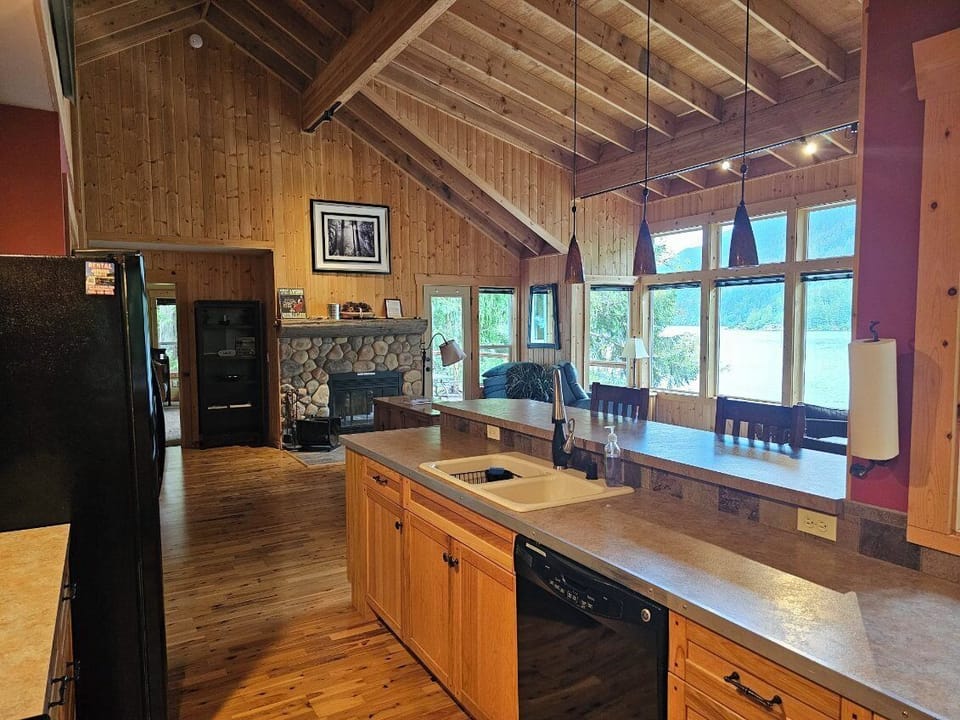 Upstairs photo of living room from kitchen.