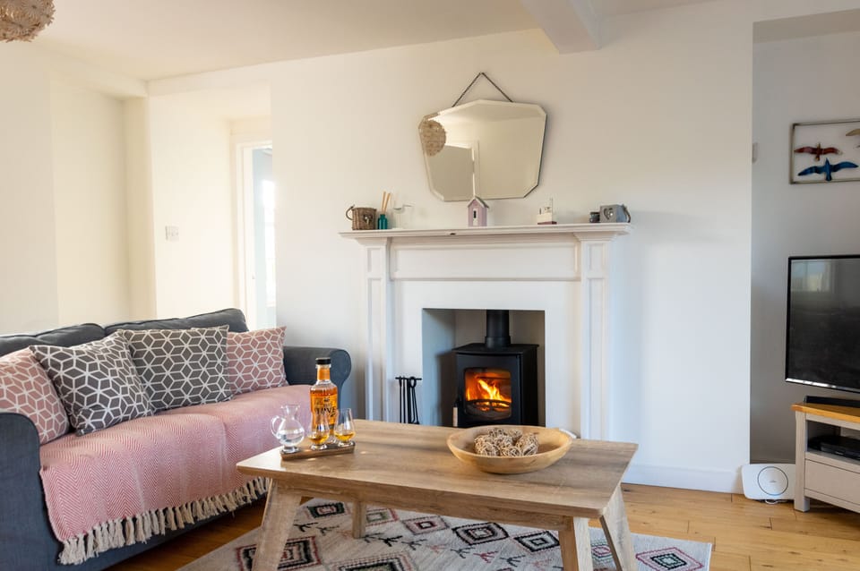 Living room with wood burning stove.