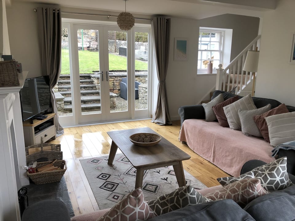 Living room with French doors to garden.