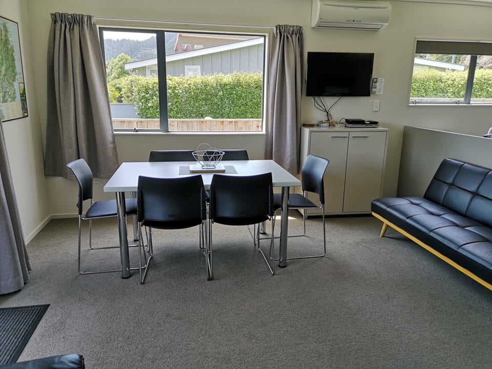 Dining Area with wall mounted TV.