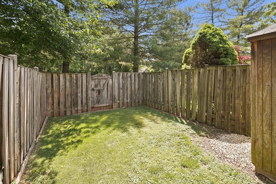 Fenced-in-yard provides peace of mind for kids & pets at play