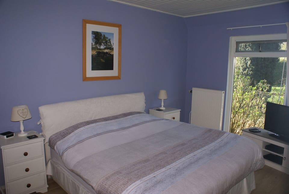 Downstairs double bedroom with built-in wardrobe, LCD tv with bluray player