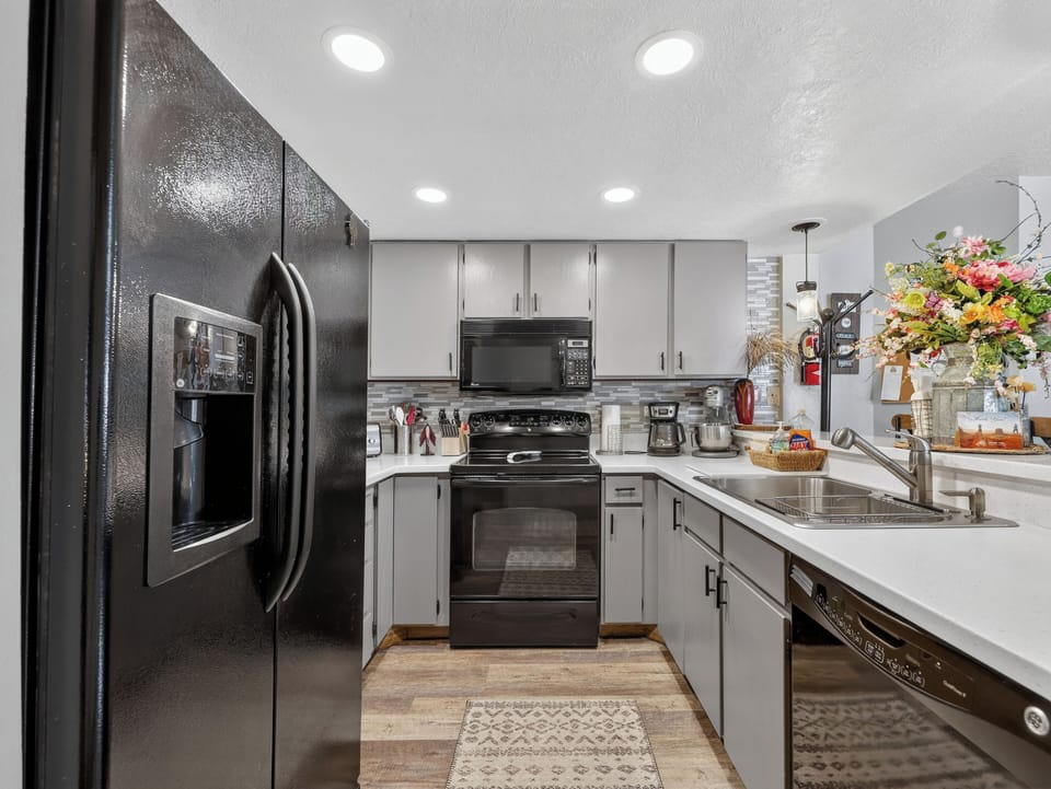 Your fully equipped kitchen awaits with modern appliances, granite counters, and everything you need to create memorable meals during your stay.