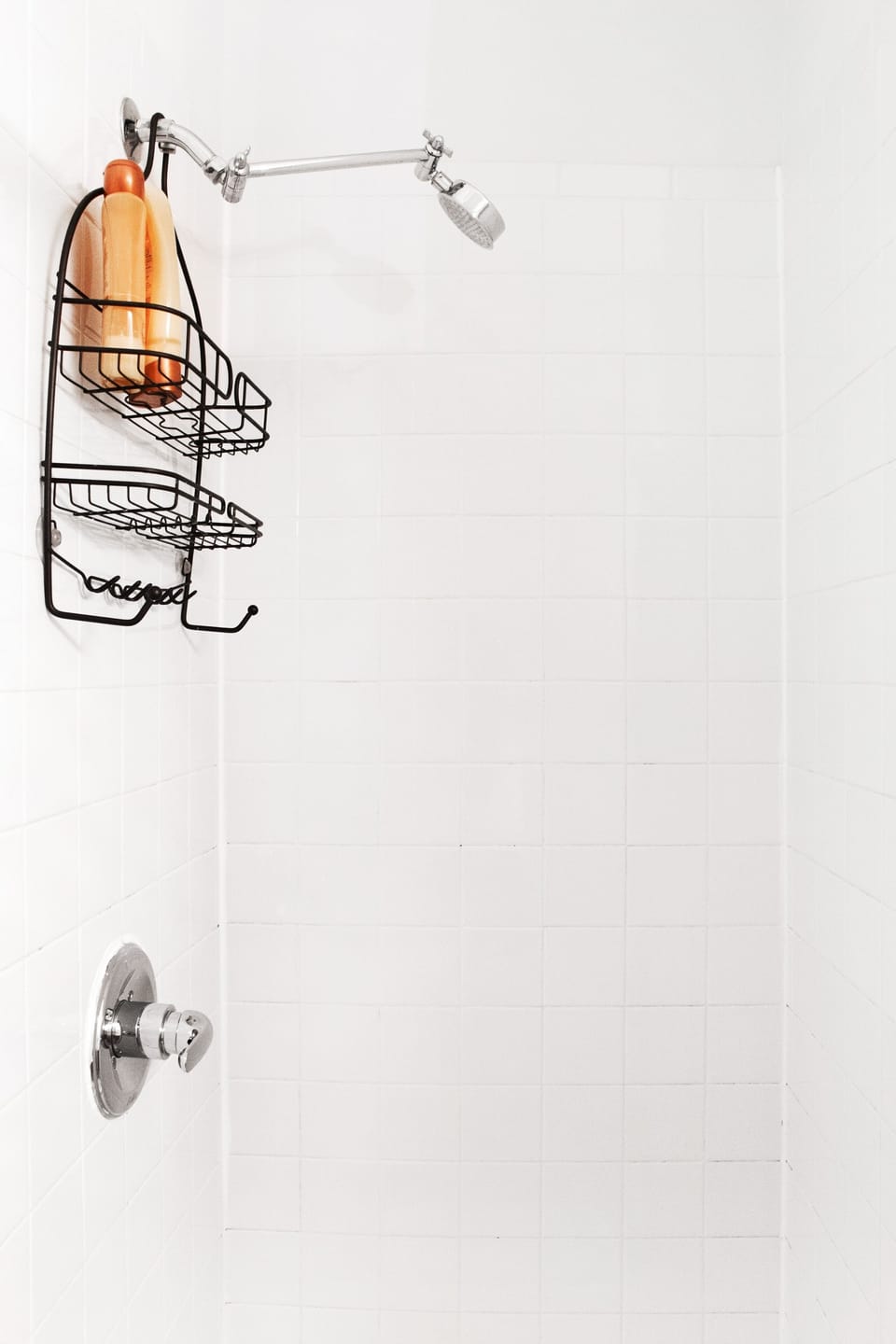 Simple white 3' x 3' stall shower in ensuite