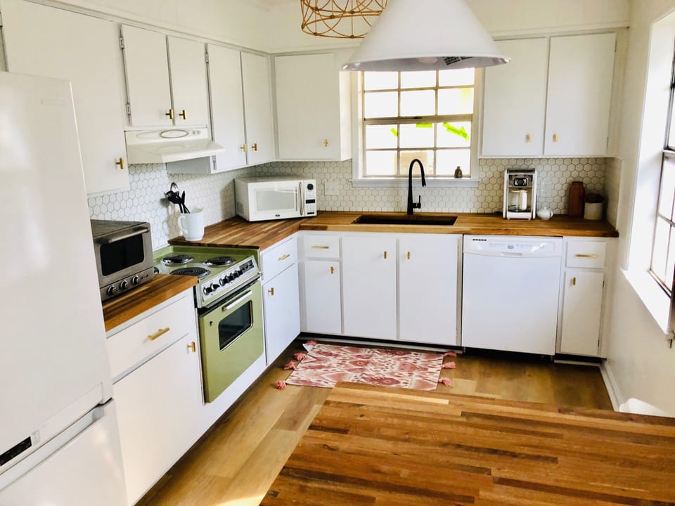 Fully equipped, bright and clean kitchen.