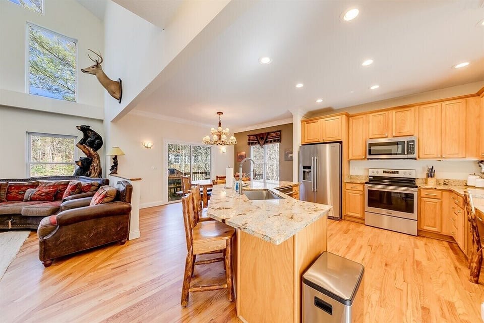 Beautiful open concept floorplan with solid surface kitchen bar