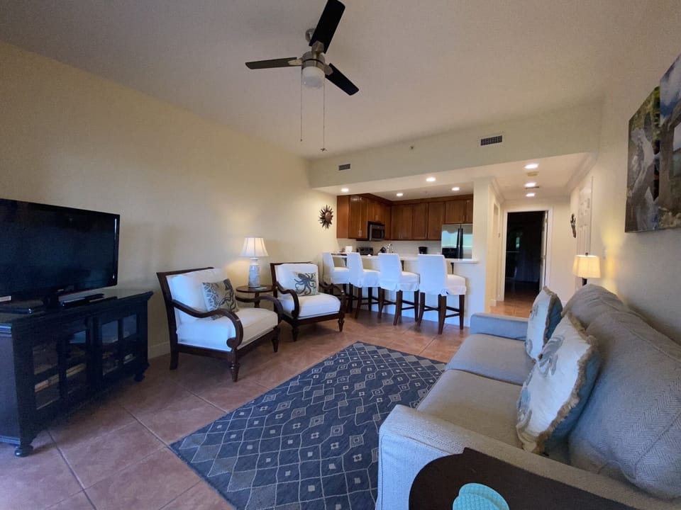 Living room with adjacent kitchen