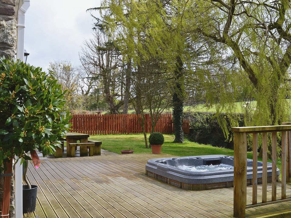 Patio with hot tub | Clawdd Offa, Penyffordd, near Chester