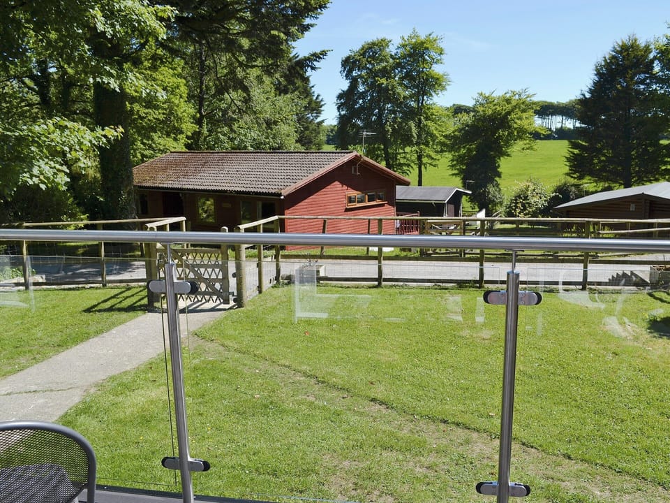 Appealing balcony with lovley views | Hives - At Berridon Lodges, Bradworthy, near Holsworthy