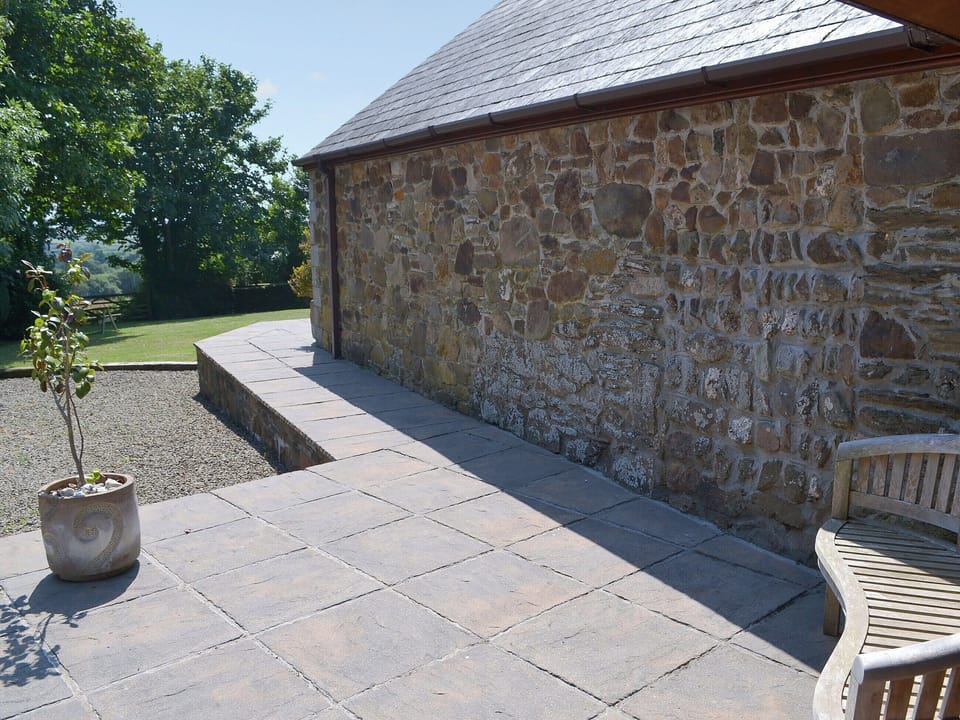 Sit out and relax on the extended patio | Coachmans Retreat, Pennytinney, St Kew