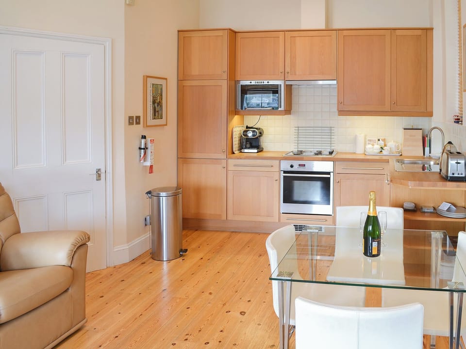 Wood floored open plan living area | Tides Reach, Fowey