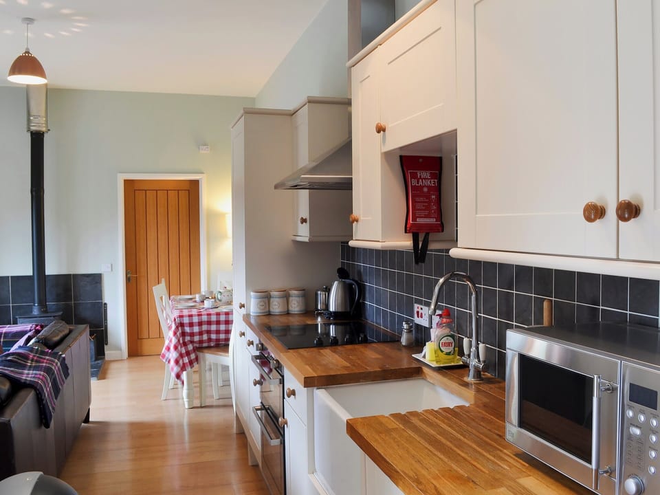 Galley-style kitchen | The Stables - Higher Farm, Martin, Fordingbridge