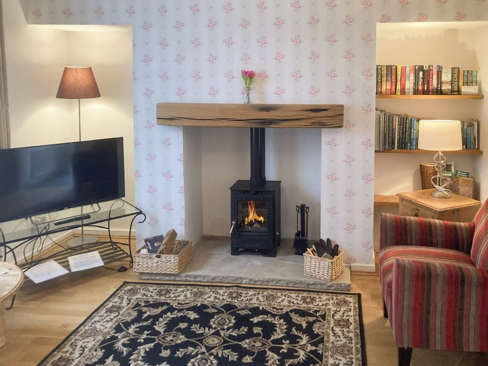Cosy lounge with log burner | Craven Cottage, Skipton