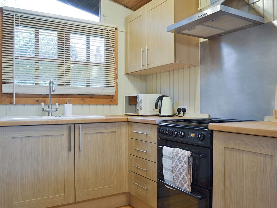 Well-equipped fitted kitchen | Pampita Lodge - Tickton Hall Cottages, Beverley