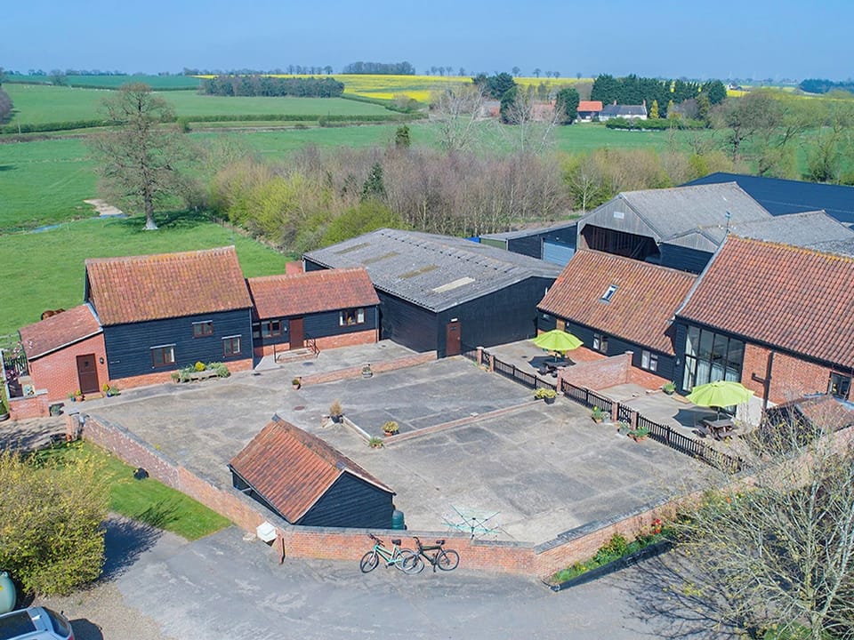 Aerial view of the barn conversions | Old Hall Farm Cottages, Walpole, near Halesworth