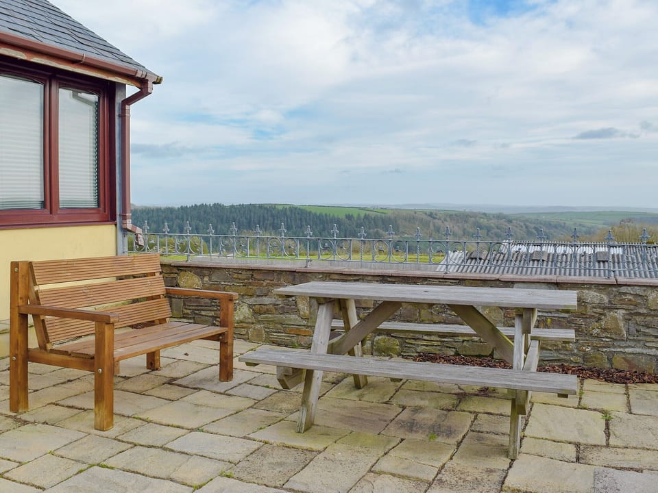 Sitting out area with views of the beautiful surrounding area | Elm Cottage - Elm Cottages, Cwmbach, near Whitland