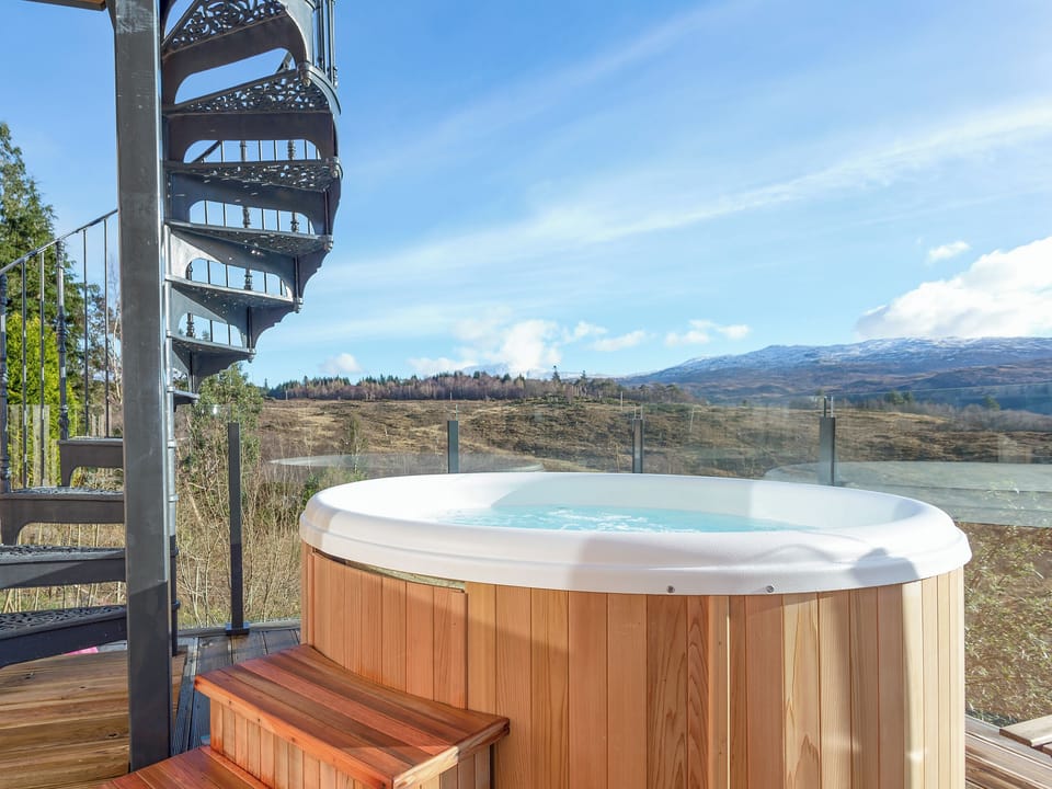Relaxing private hot tub with countryside views | Jill Strawbale House - Strawbale Collection, Strontian, near Fort William